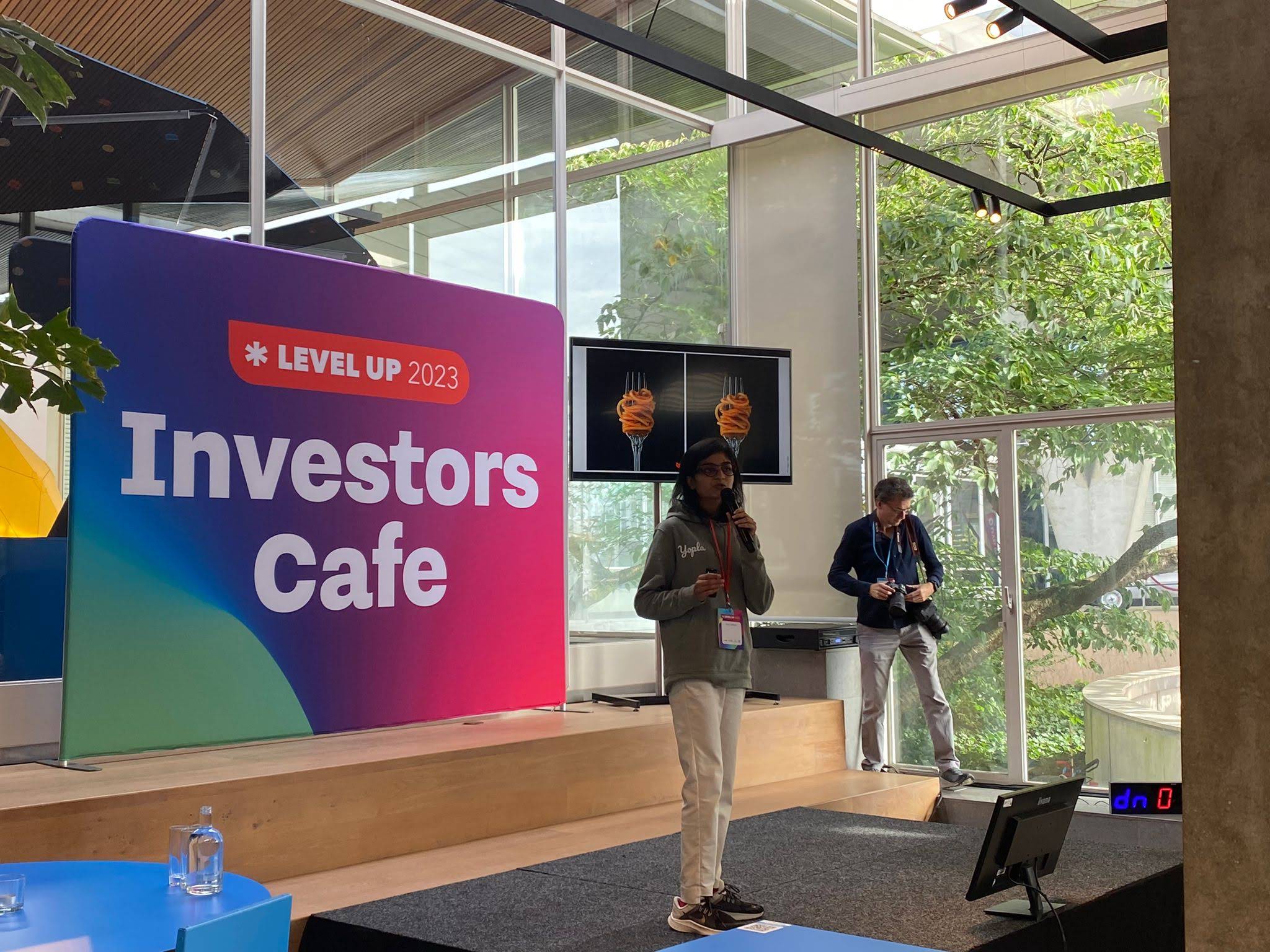 Purvi speaking at Investors Café, 2024
